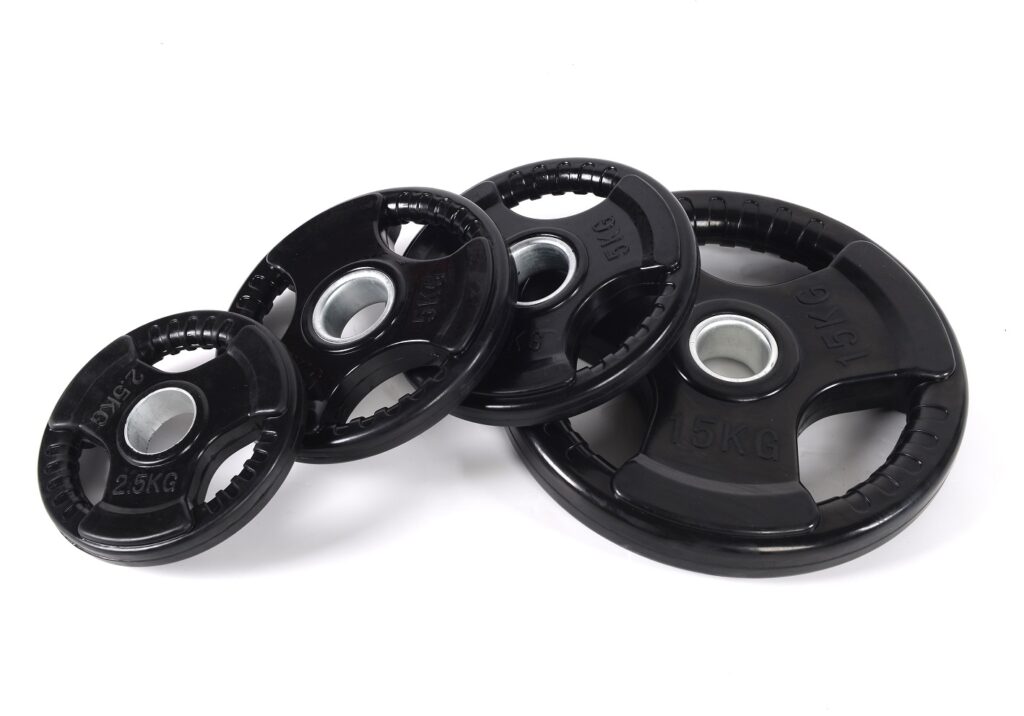 Tri-grip rubber weight plates